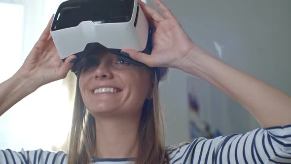 Happy Woman Wearing VR Headset
