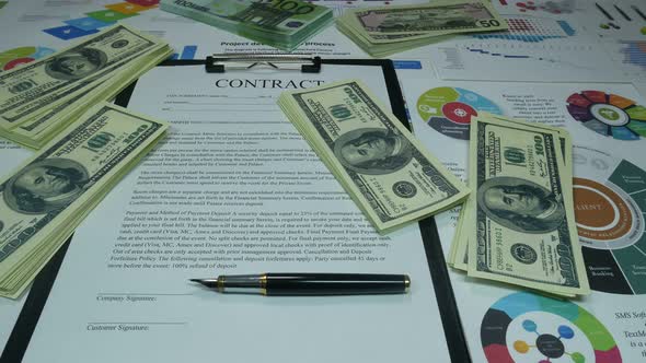 Financial Business Contract And Money On The Table