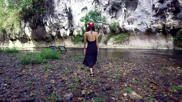 Cute Asian Girl Walking Next to the River Thailand