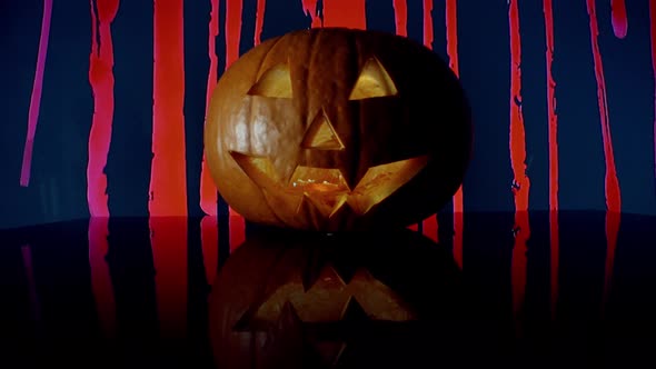 scarry halloween pumpkin on bloddy background