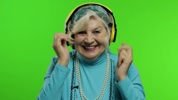 Elderly Grandmother. Caucasian Woman. Dance, Celebrate, Listen Music. Chroma Key