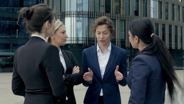 Female Confident Boss Giving Instructions To Subordinates Women Workers After the Business Meeting