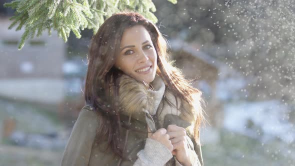 Smiling woman on a snowy day