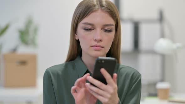 Young Woman Using Smartphone