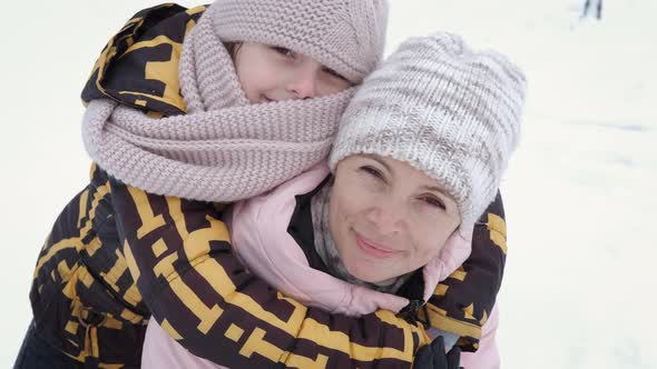 Moments with Mother in the Snow