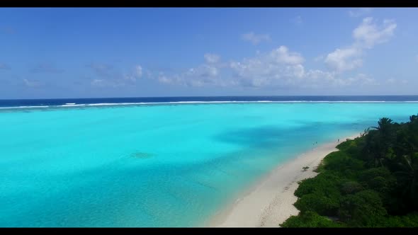 Aerial above landscape of tropical coastline beach time by blue sea with white sandy background of a