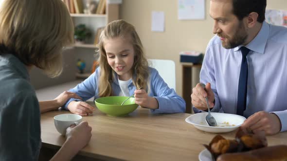 Friendly Family Eating Breakfast and Talking, Morning Ritual, Togetherness