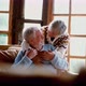 Senior people at home in love kissing and caring each other. Happy relationship mature man - VideoHive Item for Sale