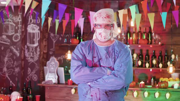 Portrait of a Man in the Costume of Mad Surgeon Blood-stained Before a Halloween Party