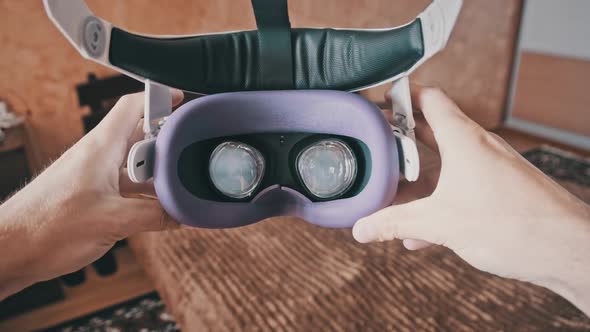 Point of View Man Taking On VR Helmet at Bedroom