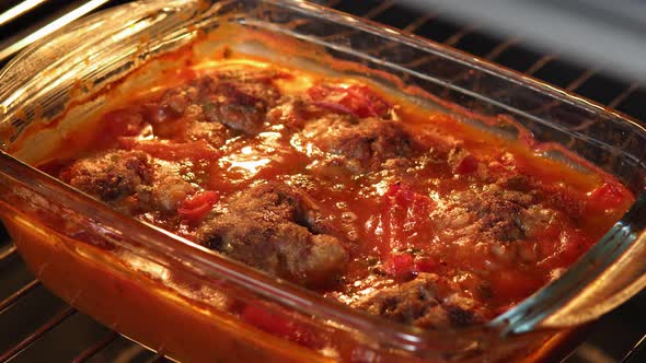 Cooking Meat Meatballs in the Oven in Tomato Sauce