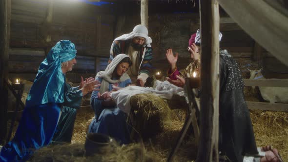 Magi and Parents Gathering Around Baby Jesus Nativity