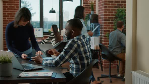 Young Woman Greeting HR Manager at Job Application Meeting