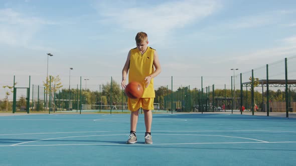 Young boy playing on the court