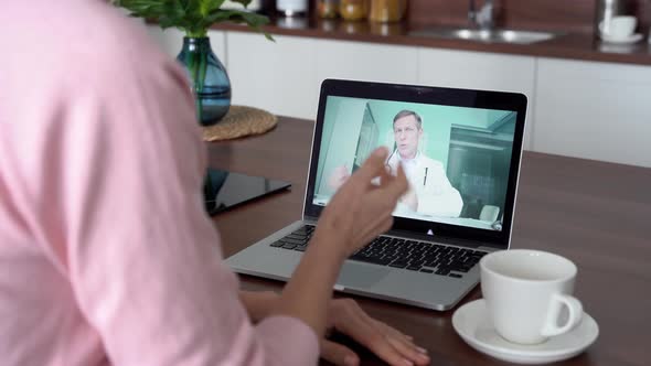 Female Patient Talking to Doctor Gets Online Telemedicine Consultation at Home