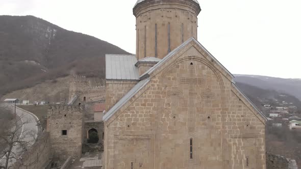 Aerial view of old Ananuri Fortress with two churches and picturesque view on river. Georgia 2021