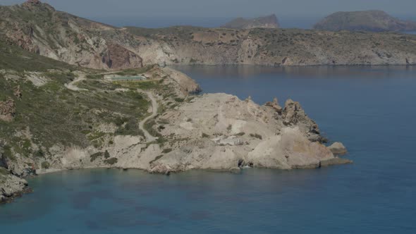 Aerial View of Cliffs Cascading into the Aegean Sea in the Island of Milos