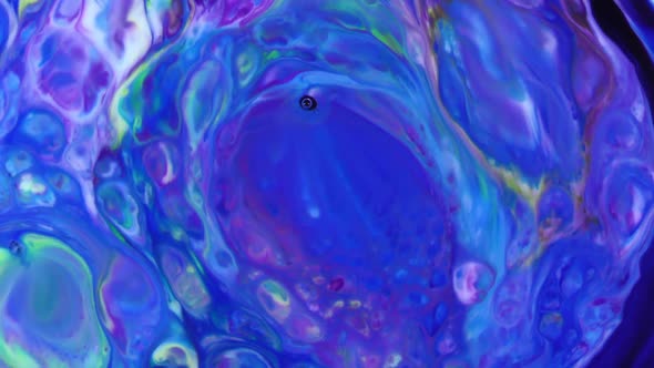 Abstract Pattern Of Colored Oil Bubbles On Water