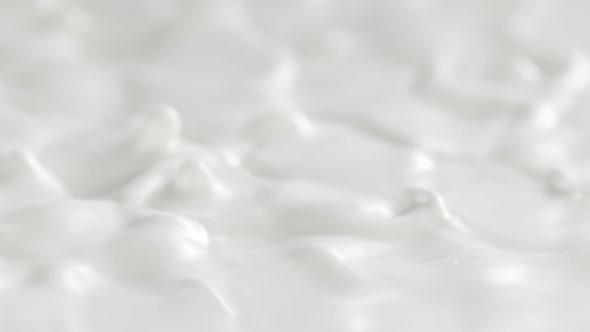 Super Slow Motion Shot of Waving Fresh Cream at 1000Fps