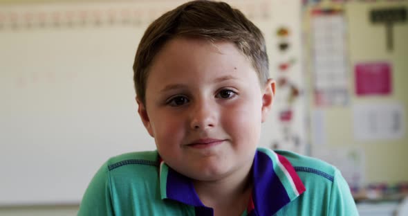 Boy smiling in the class