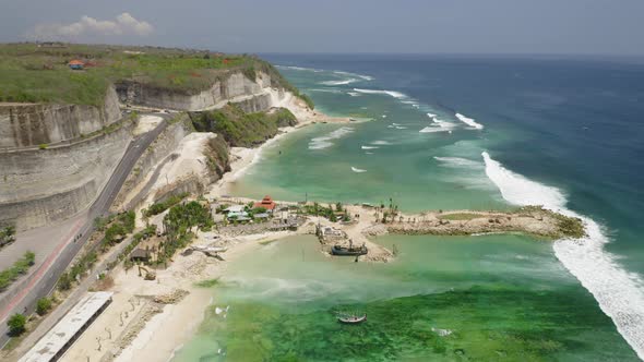 Aerial Drone Flight Over Land Tonge at Melasti Beach Bali Indonesia