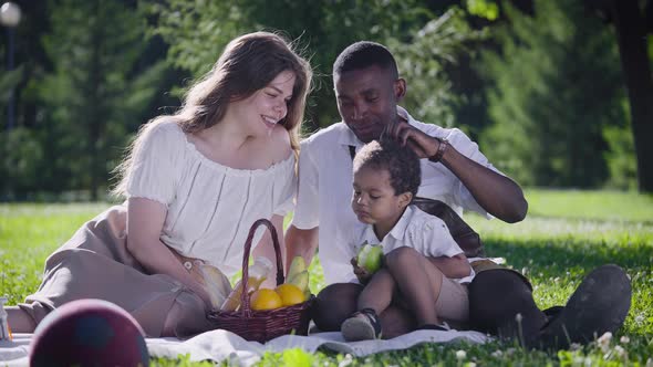 A Cute Multicultural Family Had a Picnic in the Park