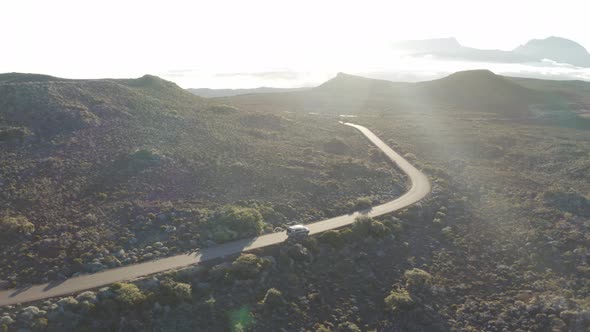 Aerial view of a car driving a serpentine road, Reunion.