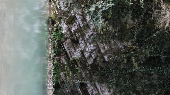 Vertical orientation video: Turquoise water in a mountain lake