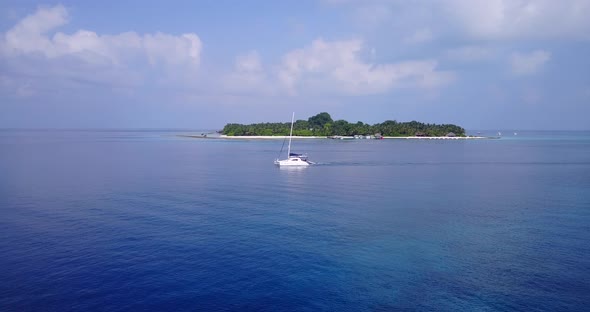 Beautiful drone abstract view of a summer white paradise sand beach and aqua turquoise water backgro