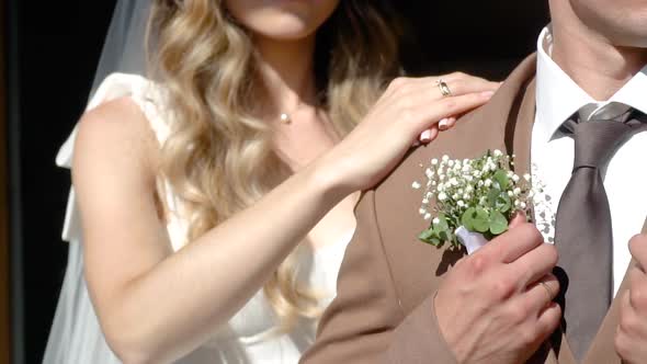 Beautiful Elegant Couple of Newlyweds Embrace on Warm Sunny Day