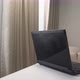 black laptop on the white table in the living room - VideoHive Item for Sale