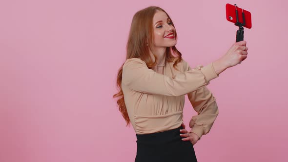Adult Girl Blogger Taking Selfie on Mobile Phone Communicating Video Call Online with Subscribers