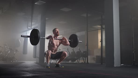 Slow Motion of Crossfit Athlete Performs Clean and Jerk