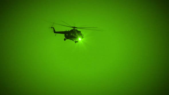 Military Helicopter Fly by in Night Vision