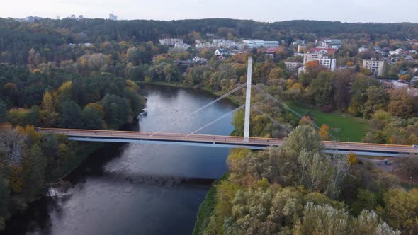 AERIAL Orbiting Shot of a Suburban District Žvėrynas in Vilnius, Lithuania with Autumn Foliage in Oc