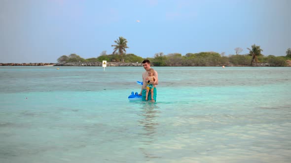 Father and Son Bathed in the Ocean and Went Ashore