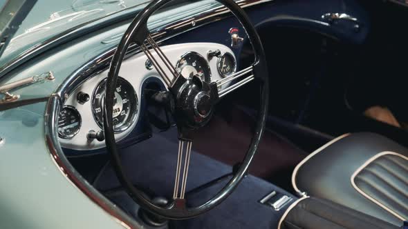View of Instrumental Panel and Wheel of Retro Car