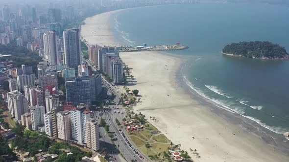 Panning wide landscape of coast city of Santos state of Sao Paulo Brazil.