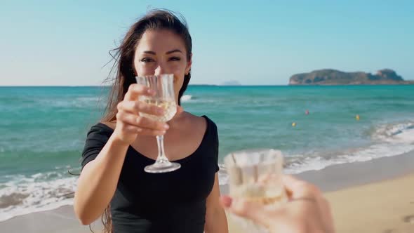 Group Man and Woman Friends Enjoy Party Drinking Champagne Together at Summer Sunset