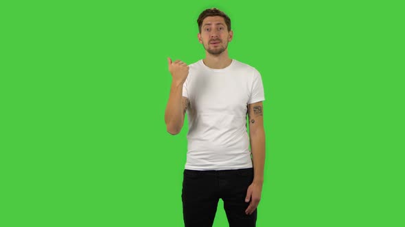 Confident Guy Is Waving Hand and Showing Gesture Come Here. Green Screen