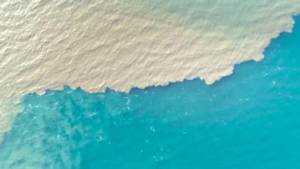 Aerial view of river and sea waters mixing in Rio, Patras city, Greece.