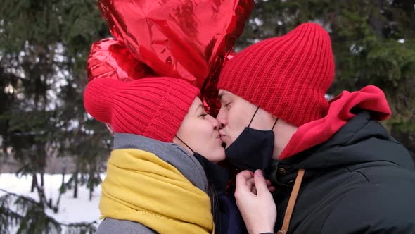 Couple Kiss in Protective Masks Coronavirus Pandemic