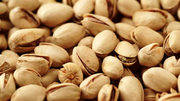 Roasted Pistachio Nuts as Food Background 