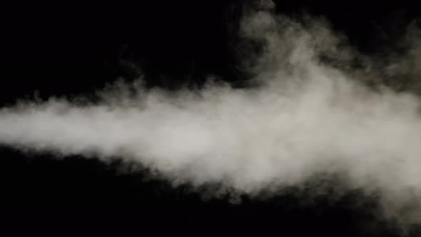 Water Vapor, White Jet of Vapour Steam Under Pressure on Black Background