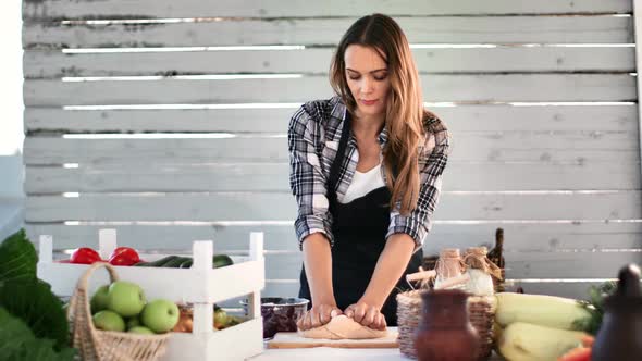 Rustic Housewife Kneading Dough Use Wheat Flour at Outdoor Kitchen Table