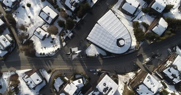 Aerial Shot of a Village in Switzerland That Was Covered in Snow at a Popular Destination for Skiers