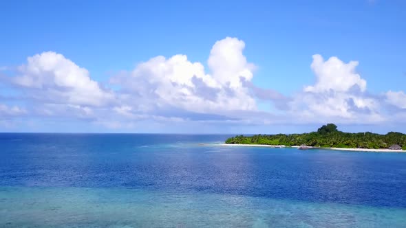 Drone view panorama of coast beach journey by ocean with sand background