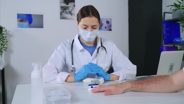 Doctor is Checking Oxygen Saturation of Patient Before Vaccination