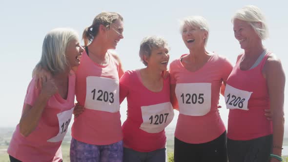 Athletics women laughing together