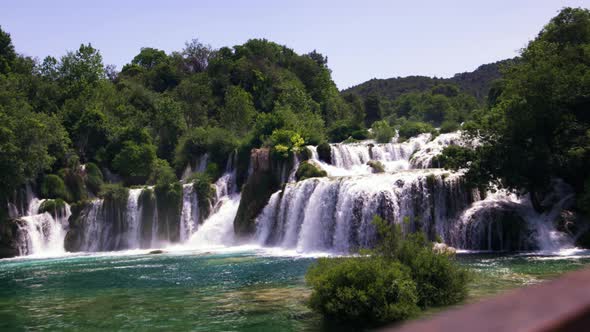 Beautiful waterfalls and forest in Krka National Park, handheld slomo